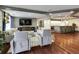 Modern living area featuring hardwood floors, recessed lighting, and open concept kitchen at 1101 Juniper St # 61, Atlanta, GA 30309