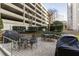 Outdoor patio area featuring grills and seating, perfect for entertaining guests at 1101 Juniper St # 61, Atlanta, GA 30309