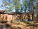 View of the side of the home, displaying multiple windows and outdoor features at 3150 Old Van Wert Rd, Villa Rica, GA 30180