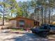 Aging single-story home with weathered exterior and a flatbed truck parked nearby at 3150 Old Van Wert Rd, Villa Rica, GA 30180