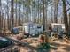 Outdoor shot of the property showcasing various items and several sheds at 3150 Old Van Wert Rd, Villa Rica, GA 30180