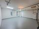 Spacious two car garage with epoxy flooring and utility access at 3780 Baxley Pine Trl, Suwanee, GA 30024