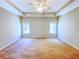 Spacious main bedroom features a trey ceiling and two windows at 3780 Baxley Pine Trl, Suwanee, GA 30024