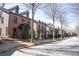 Street view showcasing a row of houses with varied architecture and landscaping at 3780 Baxley Pine Trl, Suwanee, GA 30024