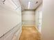Spacious walk-in closet with multiple shelves providing ample storage space at 3780 Baxley Pine Trl, Suwanee, GA 30024