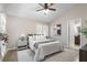 Comfortable bedroom with neutral walls, ceiling fan, and ensuite bathroom at 735 Ponce De Leon Ne Pl, Atlanta, GA 30306