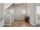 Open entryway with hardwood floors and a staircase leading to the second floor at 735 Ponce De Leon Ne Pl, Atlanta, GA 30306