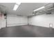 Spacious garage with a white door at 735 Ponce De Leon Ne Pl, Atlanta, GA 30306