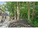 Mature trees surround the home, creating privacy in the backyard at 2423 Melinda Ne Dr, Atlanta, GA 30345