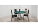 Basement recreation area features a green poker table with seating for four at 2423 Melinda Ne Dr, Atlanta, GA 30345