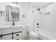 Renovated bathroom featuring a tiled shower and modern fixtures at 2423 Melinda Ne Dr, Atlanta, GA 30345