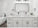 Bright bathroom with double vanity, vessel sinks, and a freestanding soaking tub at 2423 Melinda Ne Dr, Atlanta, GA 30345
