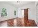 Bright bedroom with hardwood floors, natural light, and en-suite bathroom, creating a relaxing retreat at 2423 Melinda Ne Dr, Atlanta, GA 30345