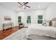 Spacious bedroom with natural light from three windows and stylish furnishings at 2423 Melinda Ne Dr, Atlanta, GA 30345