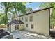 Exterior elevation showcases an expansive rear patio area at 2423 Melinda Ne Dr, Atlanta, GA 30345