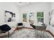 Modern office with natural light, stylish decor, and comfortable seating, perfect for remote work at 2423 Melinda Ne Dr, Atlanta, GA 30345