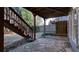 Backyard features a stone patio underneath the deck stairs, and a wooden fence at 1048 Standard Ne Dr, Atlanta, GA 30319