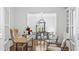 Stylish living room area featuring hardwood floors that flows into an open dining space at 1048 Standard Ne Dr, Atlanta, GA 30319