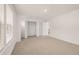 Bedroom featuring closet, carpet and view from window at 13238 Tolstoy, Covington, GA 30014