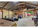 Well-equipped garage featuring a wood lathe, storage shelves, and easy outdoor access at 4027 Finch Sw Rd, Powder Springs, GA 30127