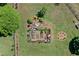 Aerial view of a beautiful fenced garden and landscaped area at 4027 Finch Sw Rd, Powder Springs, GA 30127