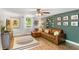 Beautiful living room with wood floors, stylish decor, and a comfortable, inviting atmosphere at 4027 Finch Sw Rd, Powder Springs, GA 30127