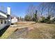 View of fenced backyard with grass at 5419 Golfcrest Cir, Stone Mountain, GA 30088