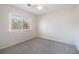 Comfortable bedroom with carpet, window and ceiling fan at 5419 Golfcrest Cir, Stone Mountain, GA 30088