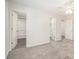 Spacious bedroom with a fan and multiple closets, plus an attached bath at 5419 Golfcrest Cir, Stone Mountain, GA 30088