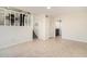 Open living area with tile flooring and staircase leading to upper level at 5419 Golfcrest Cir, Stone Mountain, GA 30088