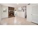 Inviting living room featuring a brick fireplace and access to the backyard at 5419 Golfcrest Cir, Stone Mountain, GA 30088