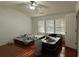 Bright bedroom with two twin beds illuminated by natural light from multiple windows at 1530 Viero Dr, Lawrenceville, GA 30044