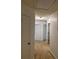 Hallway area with carpet and white walls in the home's interior at 1530 Viero Dr, Lawrenceville, GA 30044