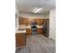Well-equipped kitchen featuring stainless steel appliances and wood cabinets at 1530 Viero Dr, Lawrenceville, GA 30044
