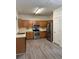 Well-equipped kitchen featuring stainless steel appliances and wood cabinets at 1530 Viero Dr, Lawrenceville, GA 30044
