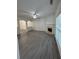 Bright living room with modern flooring, fireplace, and large windows at 1530 Viero Dr, Lawrenceville, GA 30044