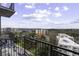 Scenic balcony view of the city skyline and lush greenery at 2233 Peachtree Ne Rd # 902, Atlanta, GA 30309