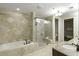 Luxurious bathroom with a soaking tub and a glass enclosed shower at 2233 Peachtree Ne Rd # 902, Atlanta, GA 30309