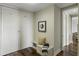 Hallway featuring hardwood floors, built-in storage and a small seating area at 2233 Peachtree Ne Rd # 902, Atlanta, GA 30309