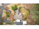 Overhead view of home with patio, driveway, and surrounding greenery at 4770 Hilltop Nw Dr, Acworth, GA 30101