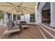 Covered deck area featuring modern outdoor furniture and stylish accents at 4770 Hilltop Nw Dr, Acworth, GA 30101
