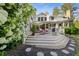 Inviting backyard deck with outdoor seating, fire pit, and lush landscaping for relaxing or entertaining at 4770 Hilltop Nw Dr, Acworth, GA 30101