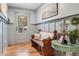 Cozy entryway with wood bench, side table, and views of the outdoors at 4770 Hilltop Nw Dr, Acworth, GA 30101