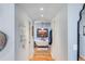 Hallway view of a freestanding bathtub, hardwood floors and decorative details at 4770 Hilltop Nw Dr, Acworth, GA 30101