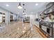 Large kitchen island with granite countertop, stainless steel appliances and long sightlines at 4770 Hilltop Nw Dr, Acworth, GA 30101