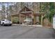 Outbuilding featuring a covered boat storage area and adjacent car parking space at 4770 Hilltop Nw Dr, Acworth, GA 30101