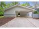 Attached carport featuring concrete driveway and landscaping at 2288 Street Deville Ne, Atlanta, GA 30345