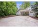 Attached carport featuring concrete driveway and landscaping at 2288 Street Deville Ne, Atlanta, GA 30345