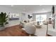 Bright and inviting living room with hardwood floors, a cozy fireplace, and a sliding door that fills the room with light at 2288 Street Deville Ne, Atlanta, GA 30345
