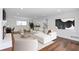 Inviting living room features hardwood floors, a fireplace, a comfortable white couch, and neutral decor at 2288 Street Deville Ne, Atlanta, GA 30345